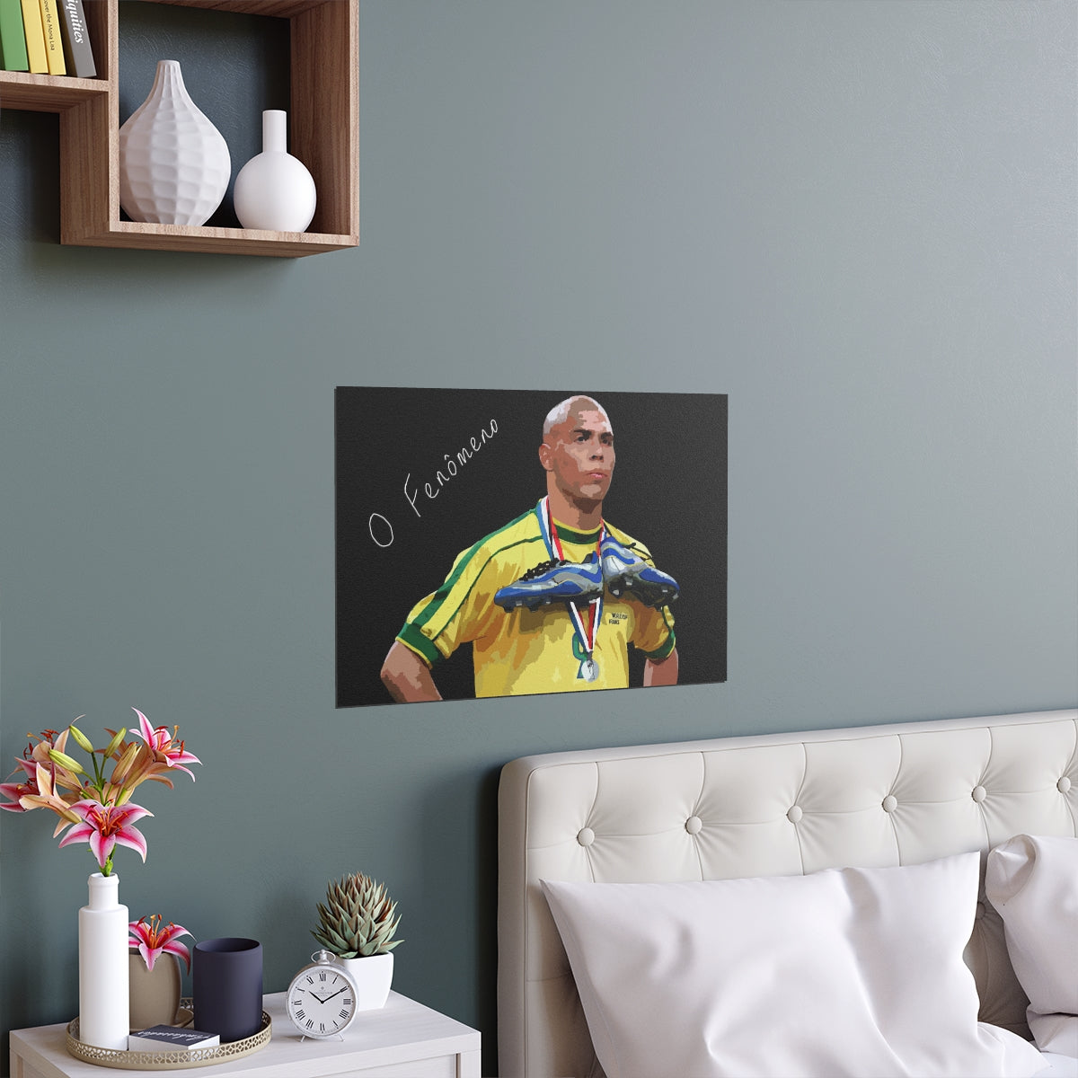 Contextual Front view of Brazilian Ronaldo with text the phenomenon on a black background black poster hanging above a double bed.