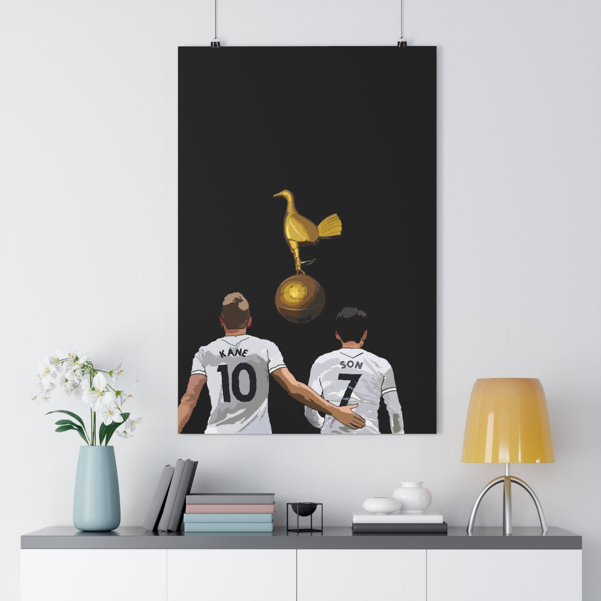 Contextual Front view of Harry Kane and Heung-Min Son with a gold cockrel on a black background hanging poster.