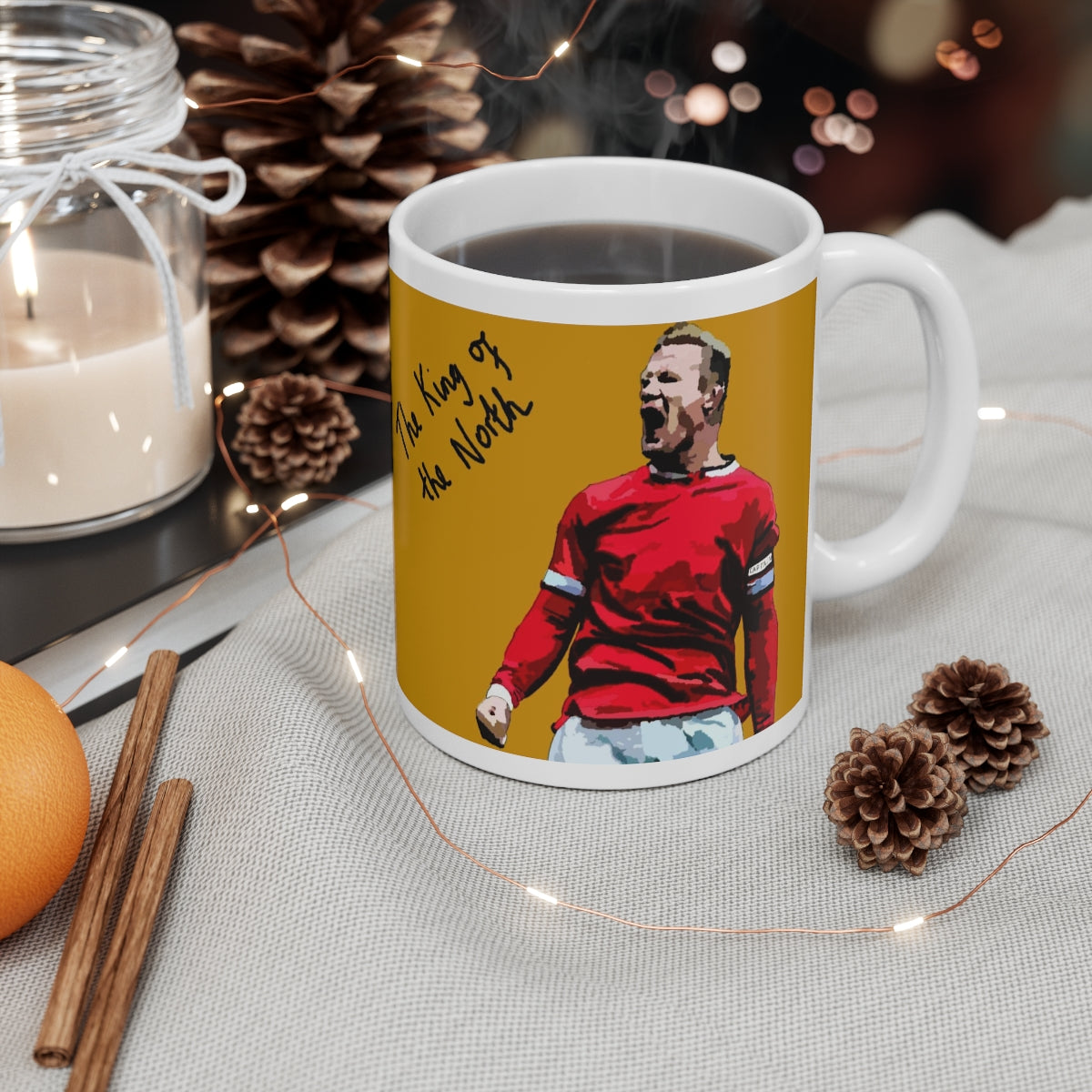 Contextual side on View of Manchester United Rooney design the king of the north orange and white ceramic mug 