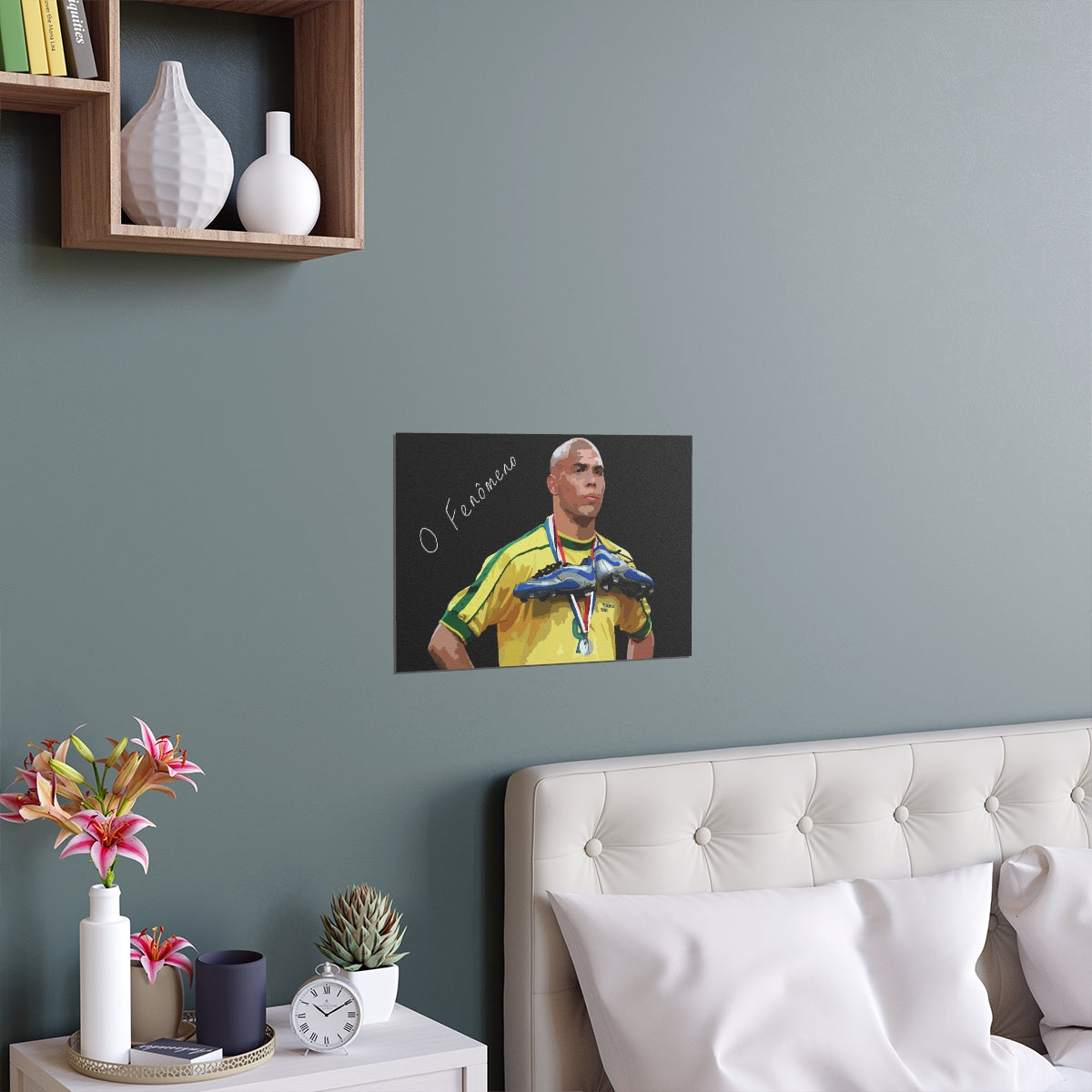 Contextual Front view of Brazilian Ronaldo with text the phenomenon on a black background black poster hanging above a double bed.